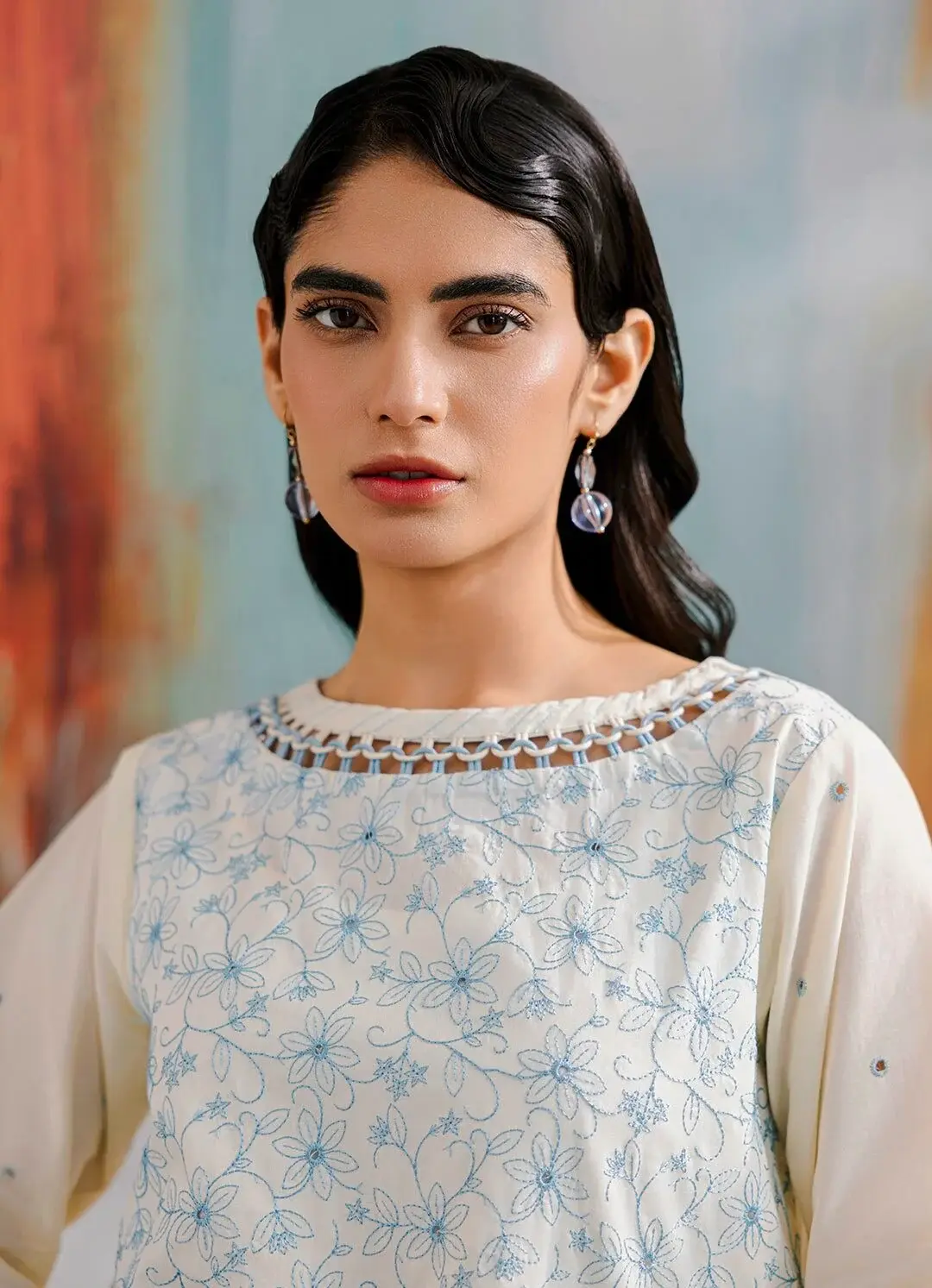 Close portrait of an off-white chikankari embroidered lawn shirt